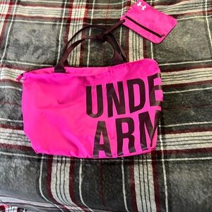 pink under armour tote style bag with extra pocket on handle
